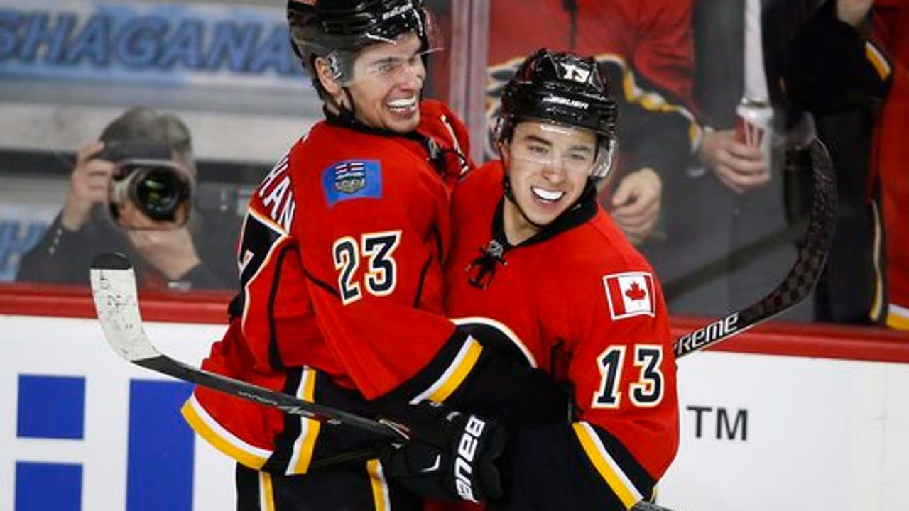 Monahan's first 4-point game powers Flames over Hurricanes